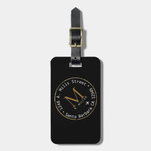 circle monogram with address on black luggage tag