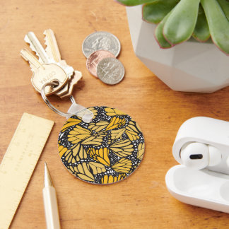 Circular key printed with monarch butterfly ring