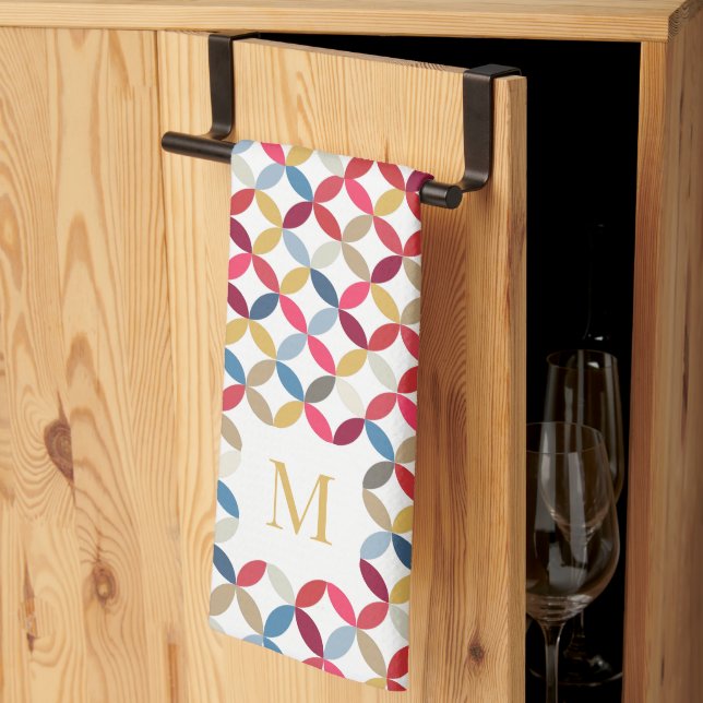 Circular quarter pattern red gold monogram tea towel (Thirds Fold)