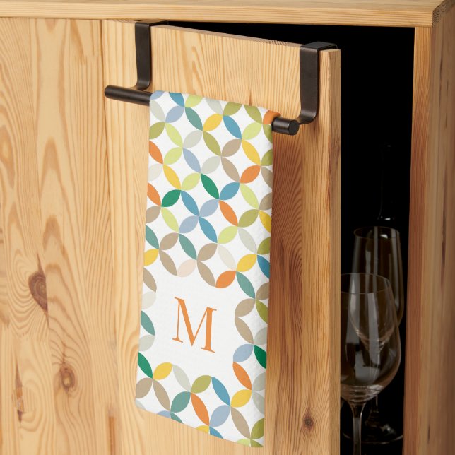 Circular quartered pattern warm tone monogram tea towel (Thirds Fold)