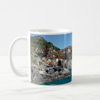 city on a cliff coffee mug