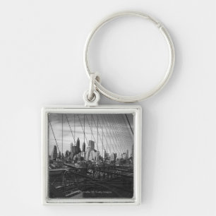 Cityscape through bridge cables key ring