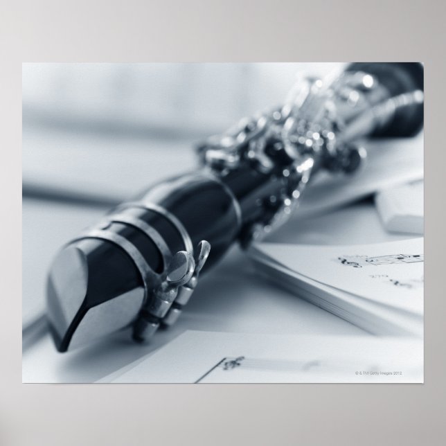 Clarinet on Music Sheets Poster (Front)