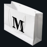 Classic Black & White Modern Letter Monogram Large Gift Bag<br><div class="desc">Stylish and modern gift bag featuring a bold monogram design. Perfect for any occasion — weddings,  birthdays,  or special celebrations. Personalise it with your own initial and colour for a touch of elegance and charm.</div>