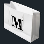 Classic Black & White Modern Letter Monogram Large Gift Bag<br><div class="desc">Stylish and modern gift bag featuring a bold monogram design. Perfect for any occasion — weddings,  birthdays,  or special celebrations. Personalise it with your own initial and colour for a touch of elegance and charm.</div>