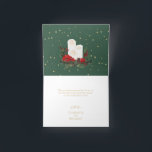 Classic Christmas Folded Wedding Thank You Card<br><div class="desc">This classic Christmas folded wedding thank you card features a clean, bright white backdrop with simple, minimalist black and gold lettering and handwritten calligraphy accents. Embellishments of beautiful and classic green and red Christmas wreaths with delicate gold features create a perfect winter holiday aesthetic while maintaining a polished elegance for...</div>