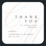 Classic Elegance Script monogram wedding favours Square Sticker<br><div class="desc">Modern classic minimalist thank you wedding favour stickers feature elegant calligraphy couple monogram and timeless serif font event details in colour editable beige,  black and white,  simple and sophisticated,  Great for formal vintage wedding,  romantic traditional wedding,  modern classic wedding in all seasons. 
See all the matching pieces in collection.</div>