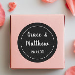 Classic Elegant Black and White Wedding Favour Round Sticker<br><div class="desc">Introducing our "Classic Elegant Black and White Wedding Favour Classic Round Sticker." Add a touch of timeless sophistication to your wedding favours with these elegant stickers, featuring a classic black and white design. Perfect for sealing envelopes, decorating favour boxes, or personalising gifts, each sticker can be customised with your names...</div>