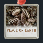 Classic Holiday Pine Cone Peace On Earth Metal Tree Decoration<br><div class="desc">Festive,  earthy pine cones set off this classic,  elegant design wishing Peace On Earth.</div>