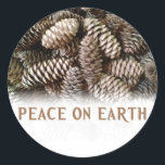 Classic Holiday Pine Cone Peace On Earth Round Sticker<br><div class="desc">Festive,  earthy pine cones set off this classic,  elegant design wishing Peace On Earth.</div>