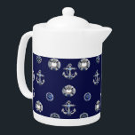 Classic Nautical Navy Blue and White<br><div class="desc">This classic Nautical Teapot includes Compasses,  Captain Wheels,  Nautical Life Buoys and Anchors all on a ink blue background. 
Find additional stylish and trendy classical Nautical Decorations and Gifting Products in our Nautical Collection.</div>