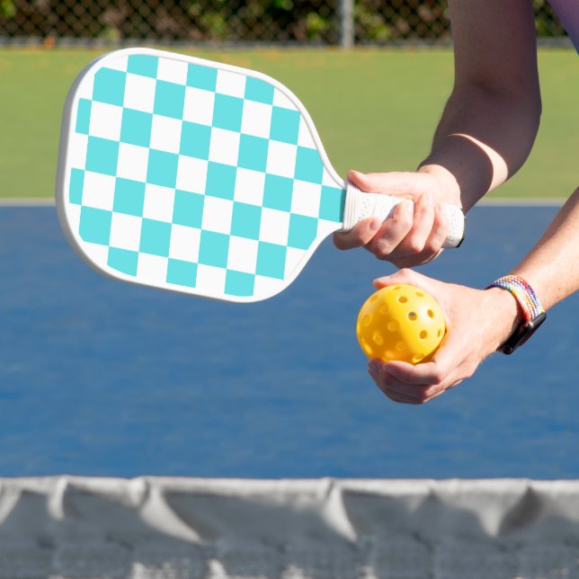 Classic visual turquoise blue chequerboard  pickleball paddle (Insitu)