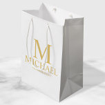 Classic White and Gold Personalised Groomsman Medium Gift Bag<br><div class="desc">Classic White and Gold Personalised Groomsman Gifts featuring personalised monogram, groomsman's name and title in gold classic serif font style. Also perfect for Best Man, Father of the Bride and more. Please Note: The foil details are simulated in the artwork. No actual foil will be used in the making of...</div>