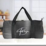 Classy Black Brushed Metal Grey White Monogram  Duffle Bag<br><div class="desc">This personalised duffel bag features a monogram and first name in modern grey and white script on an elegant black faux brushed metal background.</div>