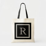 Classy luxury style monogram wedding tote bag<br><div class="desc">Classy luxury style monogram wedding tote bag. Cute bags for bride, bridesmaid, maid of honour, flower girl, mother of the bride etc. Stylish border with pretty name initial letter in the middle. Chic luxurious typography. Customisable background colour. ie black and white. Great for beautiful wedding, bridal party, bachelorette, girls weekend,...</div>