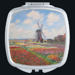 Claude Monet - Field of Tulips in Holland Compact Mirror<br><div class="desc">Field of Tulips in Holland (Champs de tulipes en Hollande) - Claude Monet,  Oil on Canvas,  1886</div>