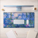 Claude Monet Shades of Blue Water Lilies Desk Mat<br><div class="desc">This desk mat showcases a beautiful painting by French Impressionist Claude Monet. It features various shades of blue,  pink and green and is one of over 200 paintings from a series by this famous artist.</div>