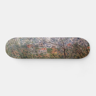 Claude Monet - Springtime through the branches Skateboard