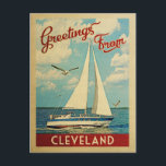 Cleveland Sailboat Vintage Travel Ohio Postcard<br><div class="desc">This Greetings From Cleveland Ohio vintage travel nautical design features a boat sailing on the water with seagulls and a blue sky filled with gorgeous puffy white clouds.</div>