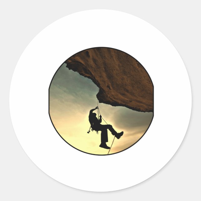 Climbing mountain man at sunset classic round sticker (Front)