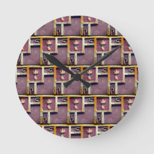 Clock with geometric design gold squares flowers
