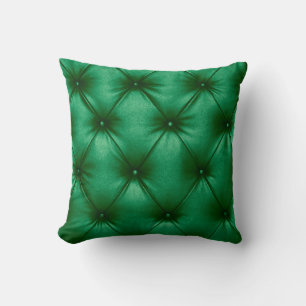 Close up background texture of dark green capitone cushion