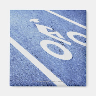 Close-up of a bicycle sign on the road magnet