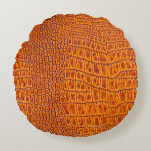 Close up of a brown reptile vintage leather textur round cushion