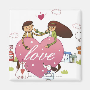 Close-up of a couple holding a heart shape magnet