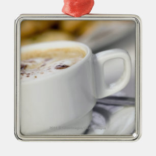 Close-up of a cup of coffee metal tree decoration