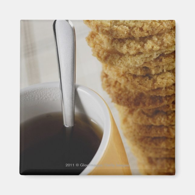 Close-up of a cup of coffee with cookies magnet (Front)