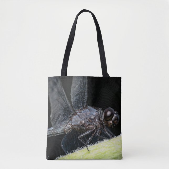 Close-up of a dragonfly, dark-eyed, perched on a l tote bag (Front)