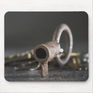 Close-up of a key in a key ring mouse pad