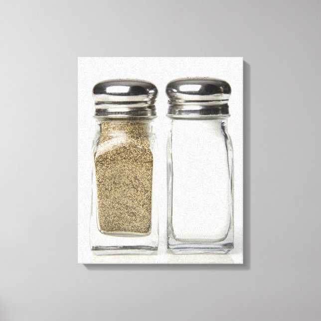 Close-up of a salt and a pepper shaker 2 canvas print (Front)