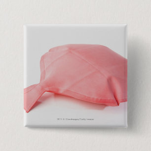 Close-up of a whoopee cushion 15 cm square badge