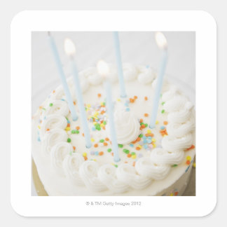 Close up of birthday cake with birthday candles square sticker