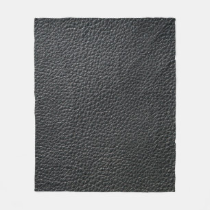 Close up of black leather texture and backgroundle fleece blanket