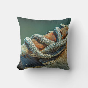 Close-up of boat cleat and rope cushion