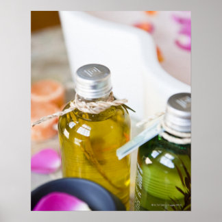 Close up of bottles with massage oils poster