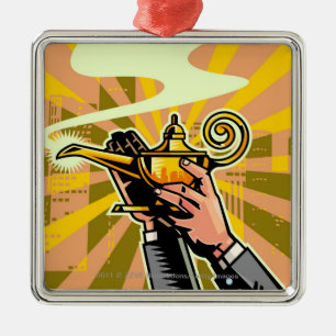Close-up of businessman holding magic lamp metal tree decoration