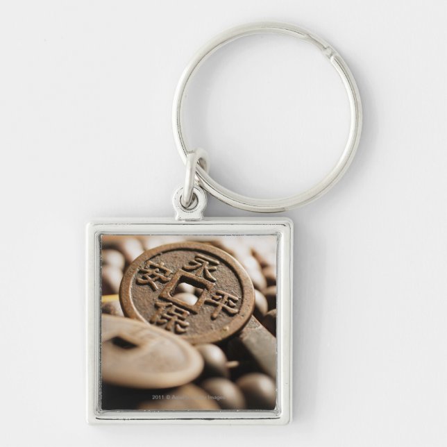 Close up of Chinese coin Key Ring (Front)
