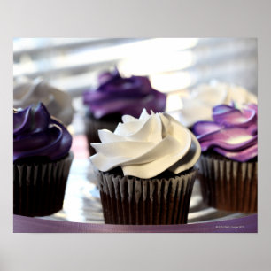 Close-up of cupcakes with selective focus on poster