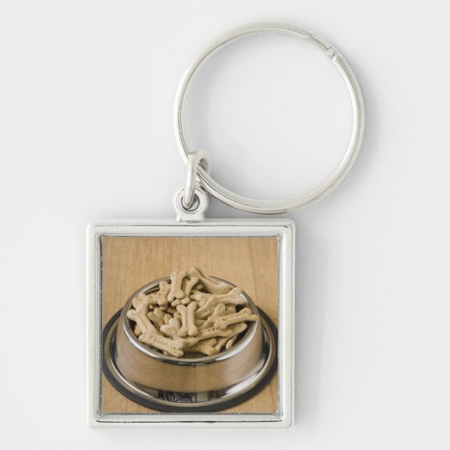 Close-up of dog biscuits in a dog bowl key ring (Front)