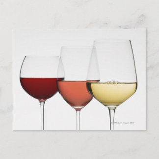 Close up of glasses of different wines postcard