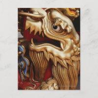 Close up of gold dragon on temple pillar