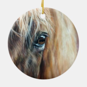 Close up of horse eye ceramic tree decoration