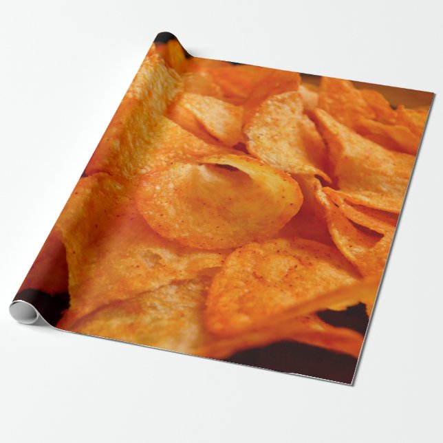 Close up of juicy, crispy, chips on black plate. wrapping paper (Unrolled)