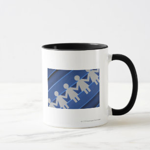 Close-up of paper chain dolls mug