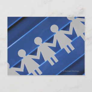 Close-up of paper chain dolls postcard