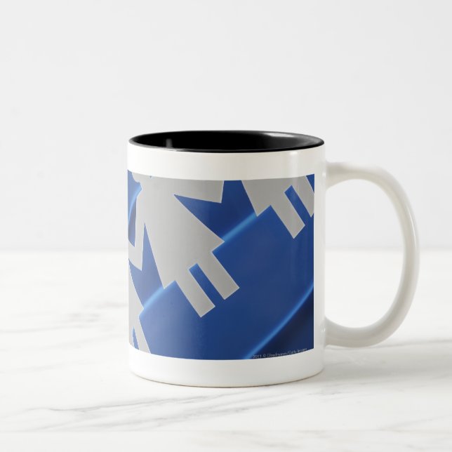 Close-up of paper chain dolls Two-Tone coffee mug (Right)